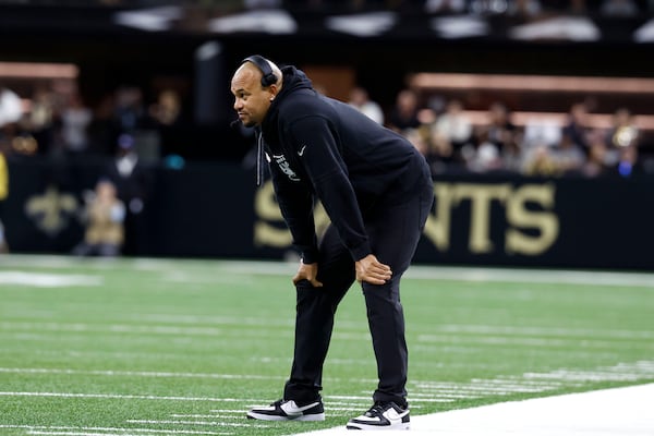 Las Vegas Raiders head coach Antonio Pierce watches from the sideline during the first half of an NFL football game against the New Orleans Saints, Sunday, Dec. 29, 2024, in New Orleans. (AP Photo/Butch Dill)