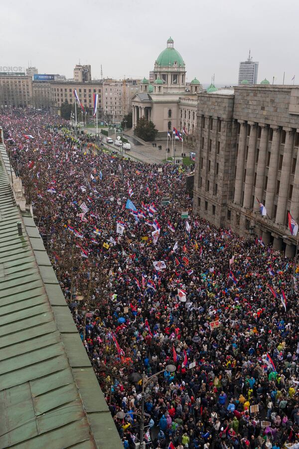 Tens of thousands gather in front of the Serbian parliament during a major anti-corruption rally led by university students in Belgrade, Serbia, Saturday, March 15, 2025. (AP Photo/Marko Drobnjakovic)