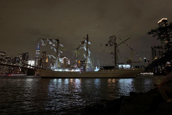 A masted Mexican Navy training ship, the Cuauhtémoc, sits stranded after colliding with the Brooklyn Bridge after, Saturday, May 17, 2025, in New York. (AP Photo/Kyle Viterbo)
