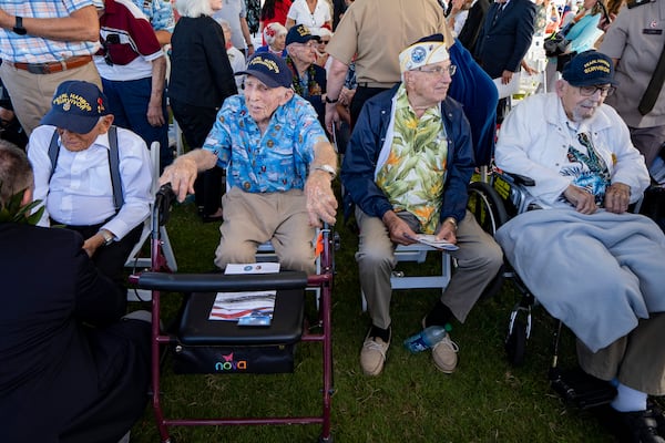 FILE - From left, Pearl Harbor survivors Harry Chandler, Ken Stevens, Herb Elfring and Ira "Ike" Schab during the 82nd Pearl Harbor Remembrance Day ceremony on Dec. 7, 2023, at Pearl Harbor in Honolulu. (AP Photo/Mengshin Lin, File)