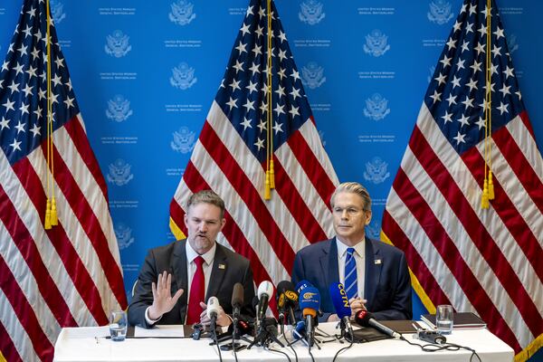 U.S. Trade Representative Jamieson Greer, left, and U.S. Secretary of the Treasury Scott Bessent take part in a press conference after two days of closed-door discussions on trade between the United States and China, in Geneva, Switzerland, Monday, May 12, 2025. (Jean-Christophe Bott/Keystone via AP)