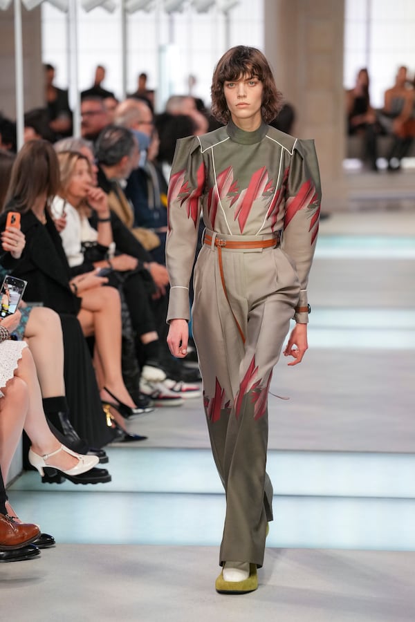 A model wears a creation as part of the Louis Vuitton Fall/Winter 2025-2026 Womenswear collection presented in Paris, Monday, March 10, 2025. (Photo by Scott A Garfitt/Invision/AP)