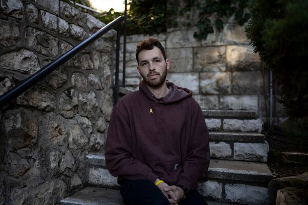 Yuval Green, a medic who abandoned his post on reserve duty with the army last January after spending nearly two months in the Gaza Strip, poses for a portrait in Jerusalem, on Thursday, Jan. 9, 2025. (AP Photo/Maya Alleruzzo)