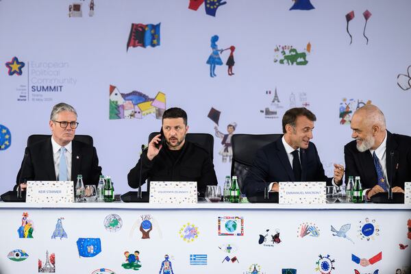 From left, Britain's Prime Minister Keir Starmer, Ukraine's President Volodymyr Zelenskyy, France's President Emmanuel Macron and Albania's Prime Minister Edi Rama attend a plenary meeting at the beginning of a summit where the leaders of 47 European countries and organizations will discuss security, defense and democratic standards, in Tirana, Albania, Friday, May 16, 2025. (Leon Neal/Pool via AP)