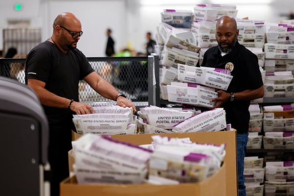 FILE - Employees sort ballots at Los Angeles County Election Center on Election Day, Tuesday, Nov. 5, 2024, in City of Industry, Calif. (AP Photo/Etienne Laurent, File)