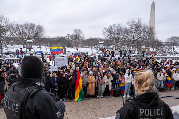 Supporters of Venezuelan opposition leader Edmundo Gonzalez gather outside of the Organization of American States, Monday, Jan. 6, 2025, in Washington. (AP Photo/Jacquelyn Martin)