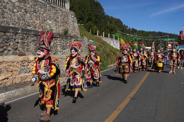 Dancers perform The Dance of the Conquest of Guatemala, depicting Spain's 1524 invasion of the K'iche' kingdom in Tejutla, in Guatemala's San Marcos department, on the feast day of the Black Christ of Esquipulas, Wednesday, Jan. 15, 2025. (AP Photo/Moises Castillo)