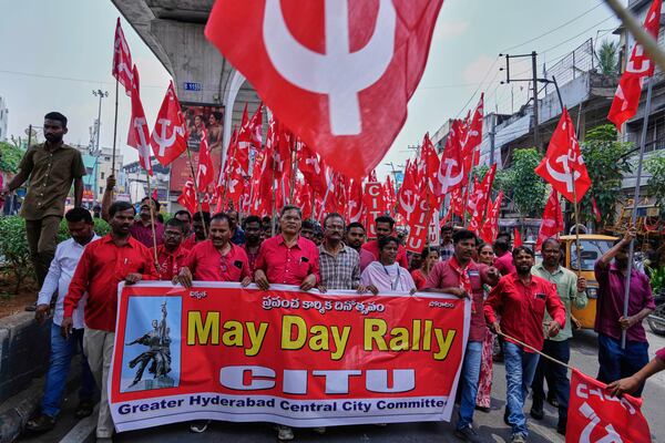 Members of Centre of India Trade Unions (CITU) participate in a rally to mark May Day in Hyderabad, India, Thursday, May 1, 2025. (AP Photo/Mahesh Kumar A.)