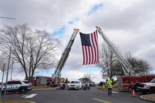 FILE - The remains of West York Borough Police Officer Andrew Duarte, arrive for his funeral at Living Word Community Church, in Red Lion, Pa., Feb. 28, 2025. (AP Photo/Matt Rourke, File)