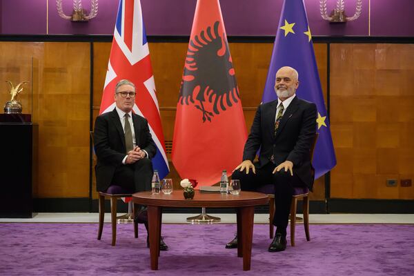 Britain's Prime Minister Keir Starmer, left, is welcomed by Albania's Prime Minister Edi Rama at the Kryeministria in Tirana, Albania, Thursday May 15, 2025. (Leon Neal/Pool via AP)