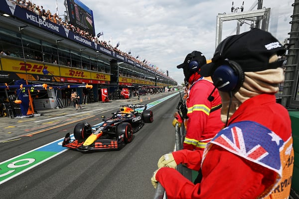 Red Bull driver Max Verstappen of the Netherlands steers his car down pit lane during qualifying the Australian Formula One Grand Prix at Albert Park, in Melbourne, Australia, Saturday, March 15, 2025. (Tracey Nearmy/Pool Photo via AP)