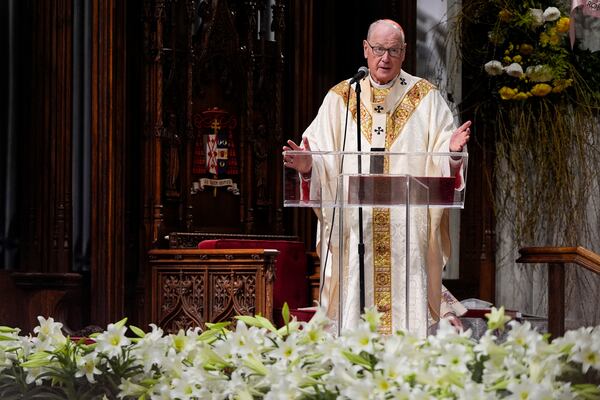 FILE - Cardinal Timothy Dolan speaks during a Mass for the late Pope Francis at St. Patrick's Cathedral, April 22, 2025, in New York. (AP Photo/Julia Demaree Nikhinson, File)