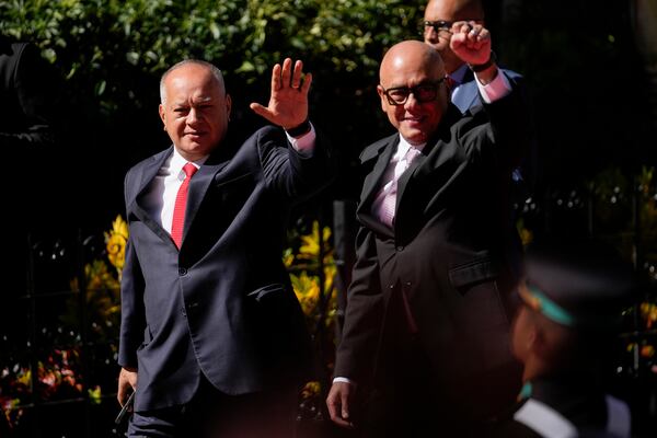 Venezuela's Interior Minister Diosdado Cabello, left, and National Assembly President Jorge Rodriguez arrive for the inauguration of President Nicolas Maduro for a third term in Caracas, Venezuela, Friday, Jan. 10, 2025. (AP Photo/Matias Delacroix)