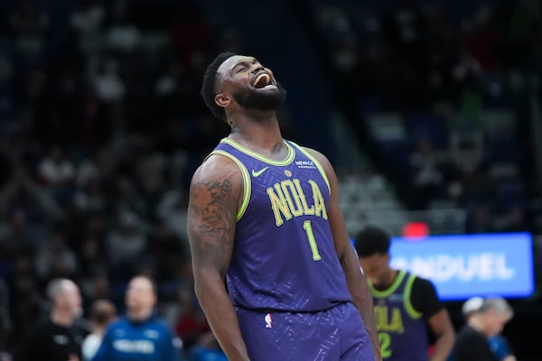 New Orleans Pelicans forward Zion Williamson (1) reacts after his slam dunk in the second half of an NBA basketball game against the Minnesota Timberwolves in New Orleans, Tuesday, Jan. 7, 2025. (AP Photo/Gerald Herbert)