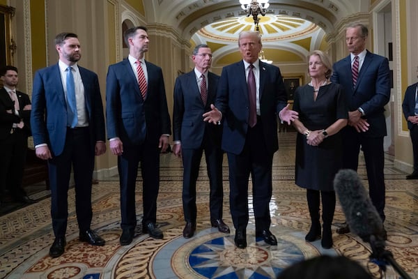 President-elect Donald Trump flanked by from left, Vice President-elect Sen. JD Vance, R-Ohio, Sen. Tom Cotton, R-Ark., Sen. John Barrasso, R-Wyo., Sen. Shelley Moore Capito, R-W.Va., and Senate Majority Leader John Thune of S.D. talks to reporters after a meeting with Republican leadership at the Capitol on Wednesday, Jan. 8, 2025, in Washington. (AP Photo/Jose Luis Magana)