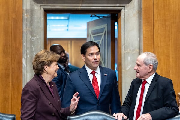 Ranking Members Sen. Jeanne Shaheen, D-N.H., left, Sen. Marco Rubio, R-Fla., President-elect Donald Trump's choice to be Secretary of State, and Chairman Jim Risch, of Idaho, arrive at the Senate Foreign Relations Committee for his confirmation hearing, at the Capitol in Washington, Wednesday, Jan. 15, 2025. (AP Photo/Alex Brandon)