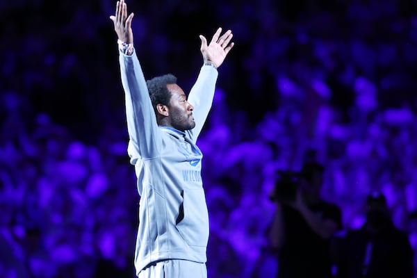 FILE - Former Kentucky player John Wall is introduced to the crowd during the second half of an NCAA college basketball game between Miami and Kentucky in Lexington, Ky., on Nov. 28, 2023. Kentucky won 95-73. (AP Photo/James Crisp, File)