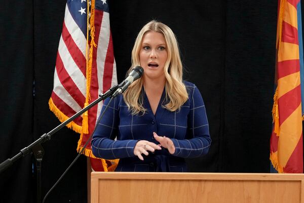 Ashley Holden of ABC 15 Arizona speaks about witnessing the execution of inmate Aaron Brian Gunches at the Arizona State Prison Wednesday, March 19, 2025 in Florence, Ariz. (AP Photo/Darryl Webb)