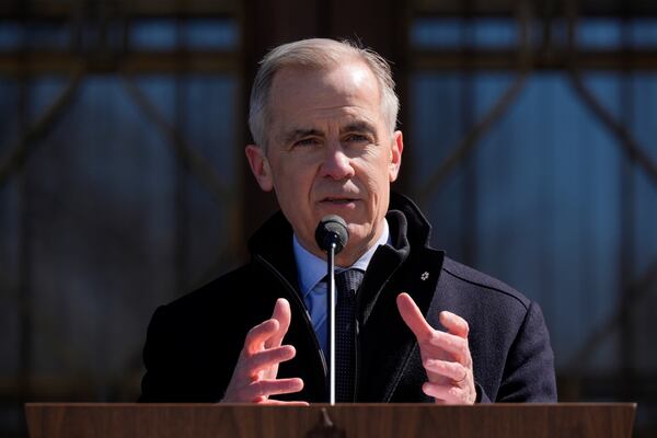 Canada Prime Minister Mark Carney speaks to media at Rideau Hall, where he asked the Governor General to dissolve Parliament and call an election, in Ottawa, Sunday, March 23, 2025. (Adrian Wyld/The Canadian Press via AP)