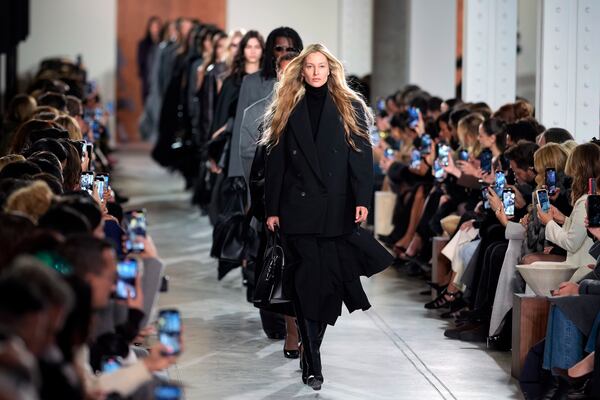 Models walk the runway during the Michael Kors Fall/Winter 2025 fashion show as part of New York Fashion Week on Tuesday, Feb. 11, 2025, at Terminal Warehouse in New York. (Photo by Charles Sykes/Invision/AP)