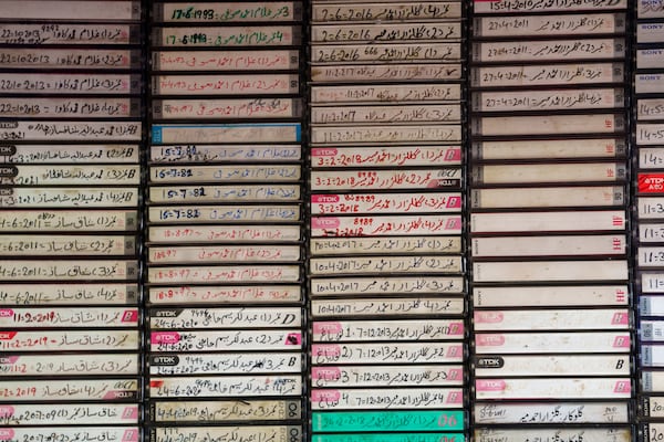 Old cassette tapes are stacked on shelves at Mohammad Ashraf Matoo’s cassette tape player repair shop in Srinagar, Indian controlled Kashmir, Tuesday, Feb. 11, 2025. (AP Photo/Dar Yasin)