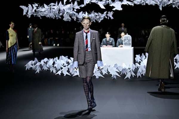 A model walks the runway during the Thom Browne Fall/Winter 2025 fashion show as part of New York Fashion Week on Tuesday, Feb. 11, 2025, at The Shed in New York. (Photo by Evan Agostini/Invision/AP)