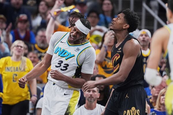 Indiana Pacers center Myles Turner (33) celebrates in the first half of Game 4 against the Cleveland Cavaliers in the Eastern Conference semifinals of the NBA basketball playoffs in Indianapolis, Sunday, May 11, 2025. (AP Photo/Michael Conroy)