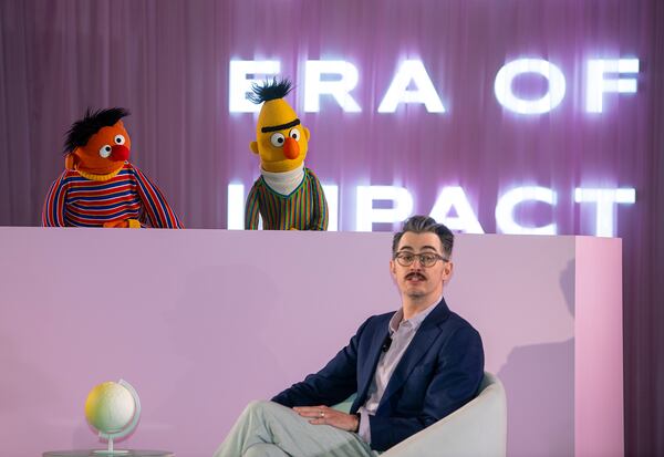Sesame Street's Bert and Ernie speak with Sal Perez, executive producer and VP of Sesame Street at Sesame Workshop, after Sesame Workshop won the Elevate Prize Foundation's Catalyst Award, Wednesday, May 14, 2025, in Miami Beach, Fla. (AP Photo/Michael Laughlin)