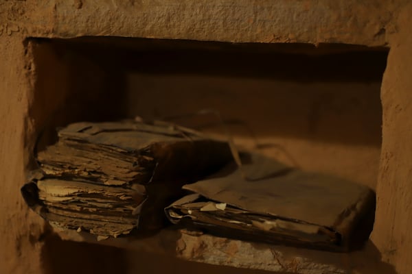 Manuscripts sit on a shelf inside one of the libraries in Chinguetti, Mauritania on Feb. 3, 2025. (AP Photo/Khaled Moulay)