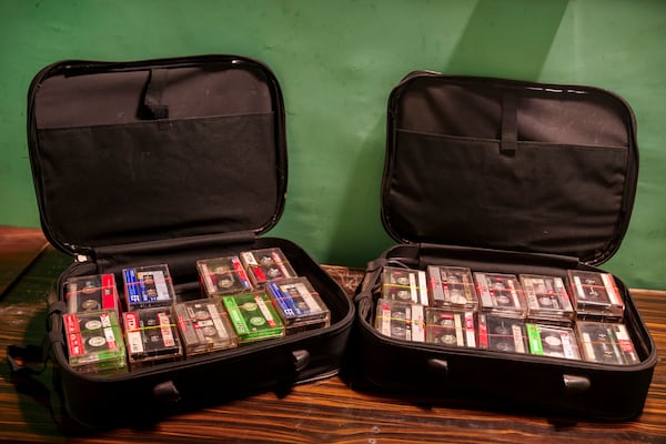 Old cassette tapes from Sufi music gatherings are stacked inside suitcases at a house in Srinagar, Indian controlled Kashmir, Friday, Feb. 14, 2025. (AP Photo/Dar Yasin)