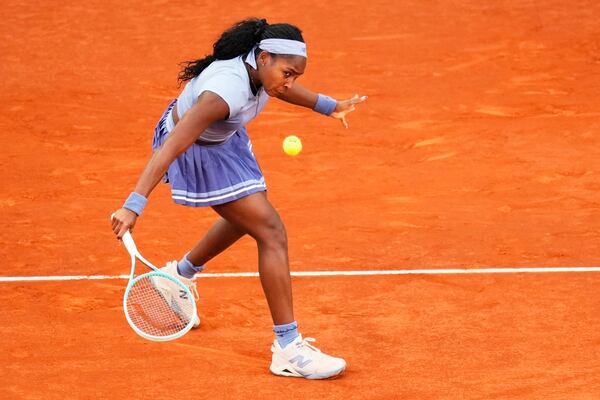 United States' Coco Gauff returns to Aryna Sabalenka of Belarus during the Madrid Open tennis final in Madrid, Spain, Saturday, May 3, 2025. (AP Photo/Jose Breton)