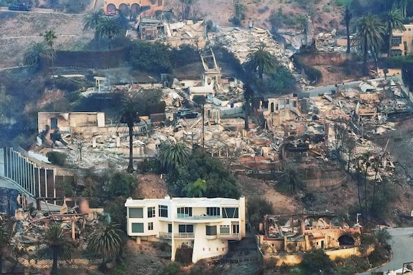 The devastation from the Palisades Fire is seen from the air in the Pacific Palisades neighborhood of Los Angeles, Thursday, Jan. 9, 2025. (AP Photo/Mark J. Terrill)