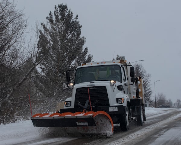 A snowplow clears a roadway in Coralville, Iowa on Wednesday, Feb. 12, 2025. (Nick Rohlman/The Gazette)