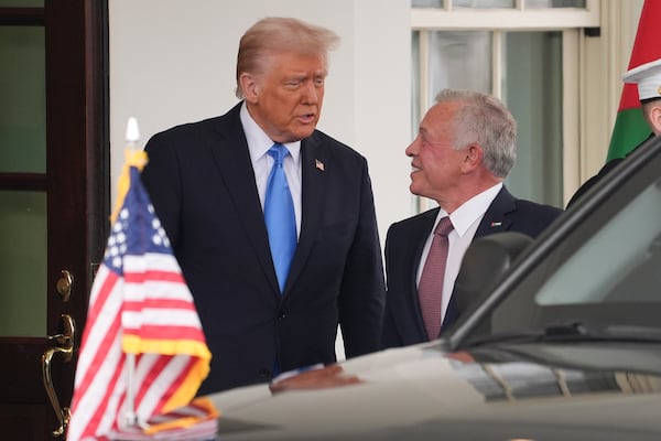 President Donald Trump greets Jordan's King Abdullah II at the White House, Tuesday, Feb. 11, 2025, in Washington. (AP Photo/Evan Vucci)