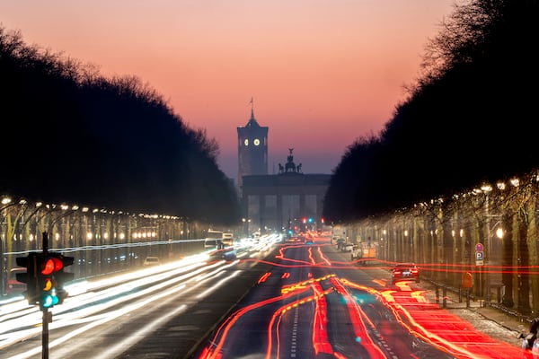 Cars move towards the Brandenburg Gate on the 17th of June Street in Berlin , Germany, Monday, Feb. 24, 2025, the day after the German election. (AP Photo/Michael Probst)