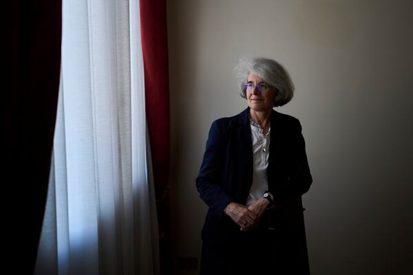 Sister Nathalie Becquart walks inside the General Secretariat of the Synod in Rome on Saturday, May 10, 2025. (AP Photo/Bernat Armangue)