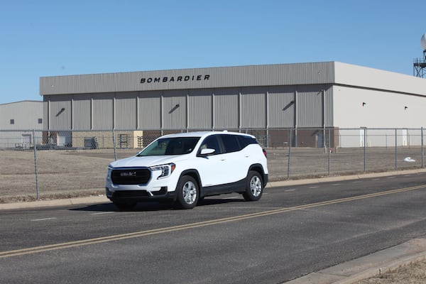 An SUV drives by the U.S. headquarters of aircraft manufacturer Bombardier Inc., Friday, Jan. 31, 2025, in Wichita, Kan. (AP Photo/John Hanna)