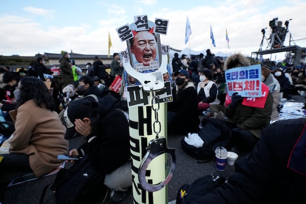 An image of impeached South Korean President Yoon Suk Yeol is displayed during a rally demanding immediate indictment of Yoon in Seoul, South Korea, Saturday, Jan. 25, 2025. The letters read "Yoon Suk Yeol." (AP Photo/Ahn Young-joon)