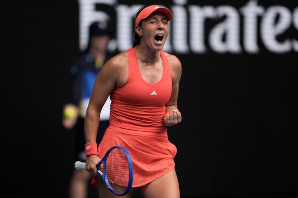 Jessica Pegula of the U.S. celebrates after defeating Elise Mertens of Belgium in their second round match at the Australian Open tennis championship in Melbourne, Australia, Wednesday, Jan. 15, 2025. (AP Photo/Ng Han Guan)