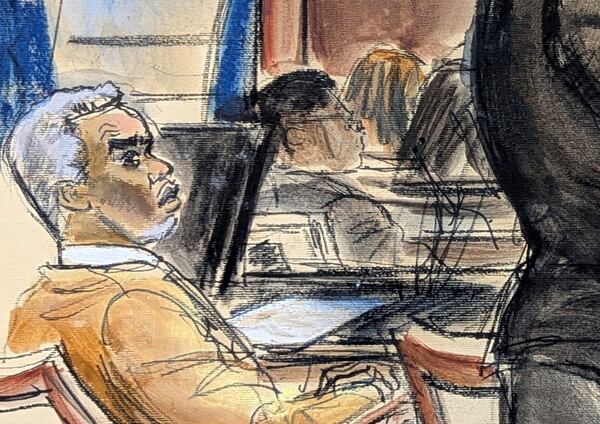 Sean "Diddy" Combs looks on as defense attorney Nicole Westmoreland cross examines Dawn Richard during Combs' sex trafficking and racketeering trial in Manhattan federal court, Monday, May 19, 2025, in New York. (Elizabeth Williams via AP)