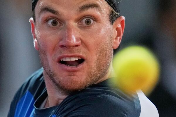 Jack Draper, of Britain, watches the ball during his match against Lorenzo Musetti, of Italy, during the men's semifinal at the Madrid Open tennis tournament in Madrid, Spain, Friday, May 2, 2025. (AP Photo/Manu Fernandez)