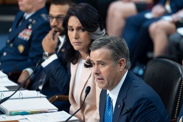 CIA Director John Ratcliffe, joined at center by Director of National Intelligence Tulsi Gabbard, testifies as the Senate Intelligence Committee holds its worldwide threats hearing, on Capitol Hill in Washington, Tuesday, March 25, 2025. (AP Photo/J. Scott Applewhite)