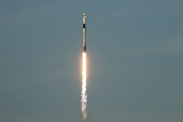 A SpaceX Falcon 9 rocket with a crew of four aboard the Crew Dragon spacecraft lifts off on a mission to the International Space Station from pad 39A at the Kennedy Space Center in Cape Canaveral, Fla., Friday, March 14, 2025. (AP Photo/Terry Renna)