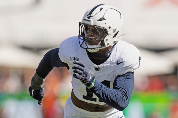 FILE - Penn State defensive end Abdul Carter (11) runs during an NCAA football game against Southern California on Saturday, Oct.12, 2024, in Los Angeles. (AP Photo/Kyusung Gong)