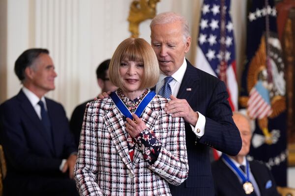 President Joe Biden, right, presents the Presidential Medal of Freedom, the Nation's highest civilian honor, to Anna Wintour in the East Room of the White House, Saturday, Jan. 4, 2025, in Washington. (AP Photo/Manuel Balce Ceneta)