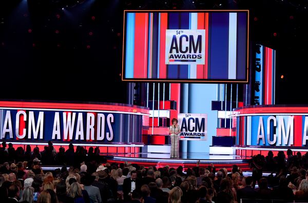 FILE - Host Reba McEntire appears on stage at the 54th annual Academy of Country Music Awards in Las Vegas on April 7, 2019. (Photo by Chris Pizzello/Invision/AP, File)
