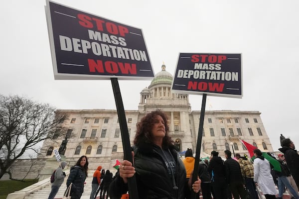 Protesters rally outside the Rhode Island State House in support of deported Brown University Dr. Rasha Alawieh, Monday, March 17, 2025, in Providence, R.I. (AP Photo/Charles Krupa)