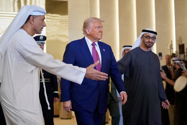 United Arab Emirates President Sheikh Mohammed bin Zayed Al Nahyan, right, greets President Donald Trump at Abu Dhabi International Airport, Thursday, May 15, 2025. (AP Photo/Altaf Qadri)