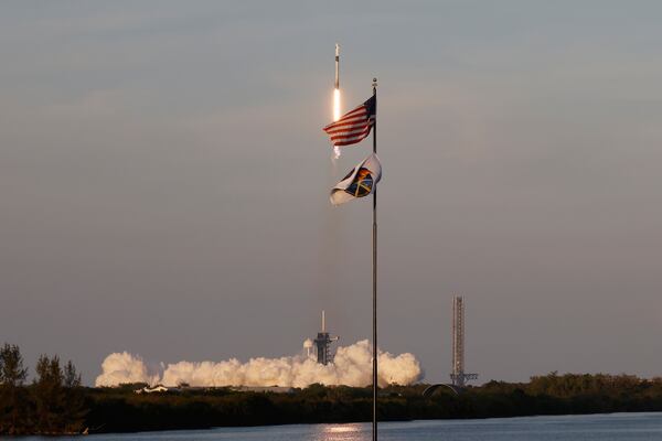 A SpaceX Falcon 9 rocket with a crew of four aboard the Crew Dragon spacecraft lifts off on a mission to the International Space Station from pad 39A at the Kennedy Space Center in Cape Canaveral, Fla., Friday, March 14, 2025. (AP Photo/Terry Renna)