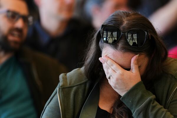 An attendee reacts during a town hall event with Rep. Marie Gluesenkamp Perez, D-Wash., at Centralia College Tuesday, April 22, 2025, in Centralia, Wash. (AP Photo/Lindsey Wasson)